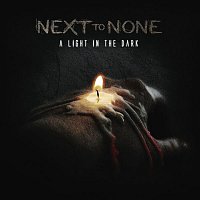 Next To None – A Light in the Dark