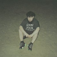 Přední strana obalu CD neither would i