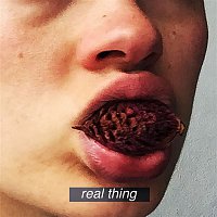 Přední strana obalu CD Real Thing